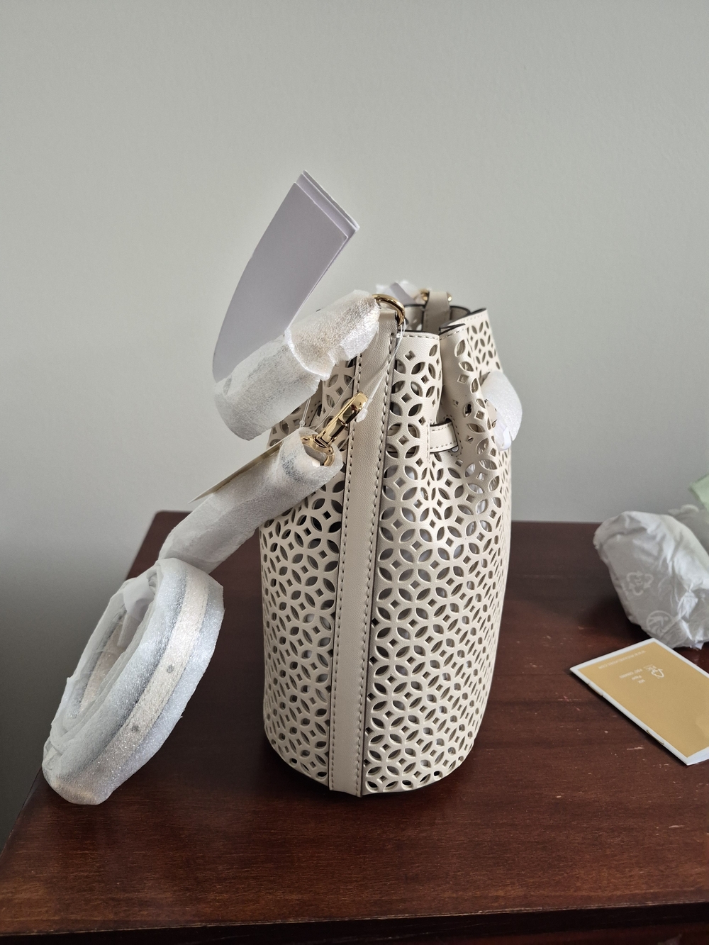 Michael Kors Cream Laser-Cut Bucket Tote